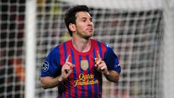 Lionel Messi berhasil memenangkan penghargaan sepatu emas Liga Champions sebanyak enam kali. Tetapi, penampilan paling produktifnya datang pada musim 2011/12. La Pulga berhasil mencetak 14 gol, dimana 8 gol diantaranya dicetak saat fase gugur. Sayangnya pada musim tersebut Barcelona tersingikir di babak semifinal. (AFP/Olivier Morin)