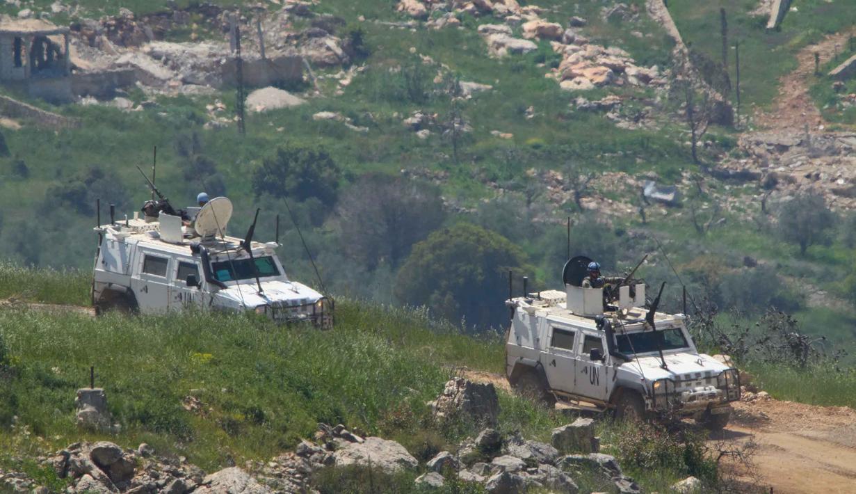Pada periode Maret-April 2026, enam personel pasukan UNIFIL gugur di Lebanon, empat di antaranya anggota Tentara Nasional Indonesia. Sementara, dua lainnya merupakan personel militer dari Prancis. Tampak dalam foto, Pasukan Perdamaian Perserikatan Bangsa Bangsa (PBB) di Lebanon (United Nations Interim Force in Lebanon/UNIFIL) terlihat dari Israel Utara, saat beroperasi di Lebanon Selatan, pada Rabu 29 April 2026. (AP Photo/Ariel Schalit)