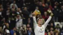 Pemain Real Madrid, Cristiano Ronaldo merayakan golnya ke gawang Malmo FF pada lanjutan Liga Champions Grup A di Stadion Satiago Bernabeu, Rabu (9/12/2015) dini hari WIB. (AFP Photo/ Pierre-Philippe Marcou)