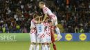 Para pemain Kroasia merayakan gol yang dicetak oleh Andrej Kramaric ke gawang Armenia pada laga Kualifikasi Euro 2024 di Stadion Vazgen Sargsyan Republican, Armenia, Senin (11/9/2023). Kroasia menang dengan skor 1-0. (AFP/Karen Minasyan)