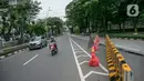 Suasana lalu lintas di kawasan Lapangan Banteng, Jakarta, Rabu (21/1/2021). Selain simbol kerukunan antarumat Islam dan Kristiani, terowongan silaturahmi Masjid Istiqlal-Gereja Katedral juga dibangun sebagai fasilitas untuk memudahkan jemaah. (Liputan6.com/Faizal Fanani)