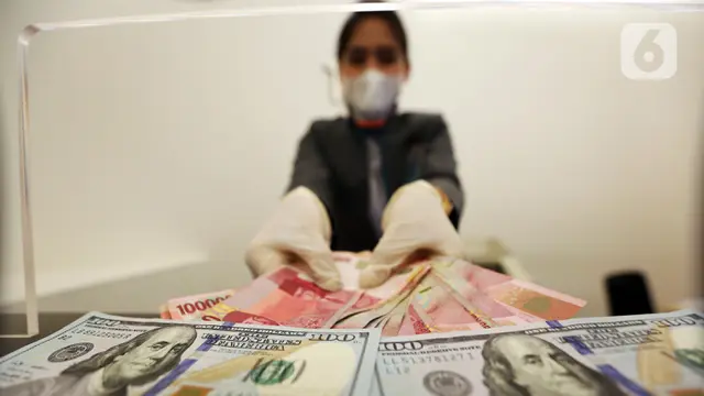 Rupiah Dibuka Loyo dari Dolar AS, Hampir Tembus 16.000