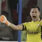 Kiper Persija Jakarta, Andritany Ardhiyasa, merayakan gol yang dicetak oleh Marko Simic ke gawang Arema FC pada laga Liga 1 di SUGBK, Jakarta, Sabtu (31/3/2018). Babak pertama berakhir imbang 1-1. (Bola.com/M Iqbal Ichsan)