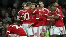 Penyerang muda Manchester United, Marcus Rashford, merayakan gol yang dicetaknya ke gawang Midtjylland. Gol Setan Merah dicetak oleh sebuah gol bunuh diri, dua gol Rushford dan sebuah gol Herrera serta Depay. (EPA/Nigel Roddis)