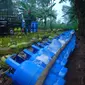 Tempat pengoplosan gas elpiji di Kampung Banjarpinang, Desa Tamansari, Kecamatan Rumpin, Kabupaten Bogor, digerebek anggota TNI, Senin (19/2/2018). (Liputan6.com/Achmad Sudarno)