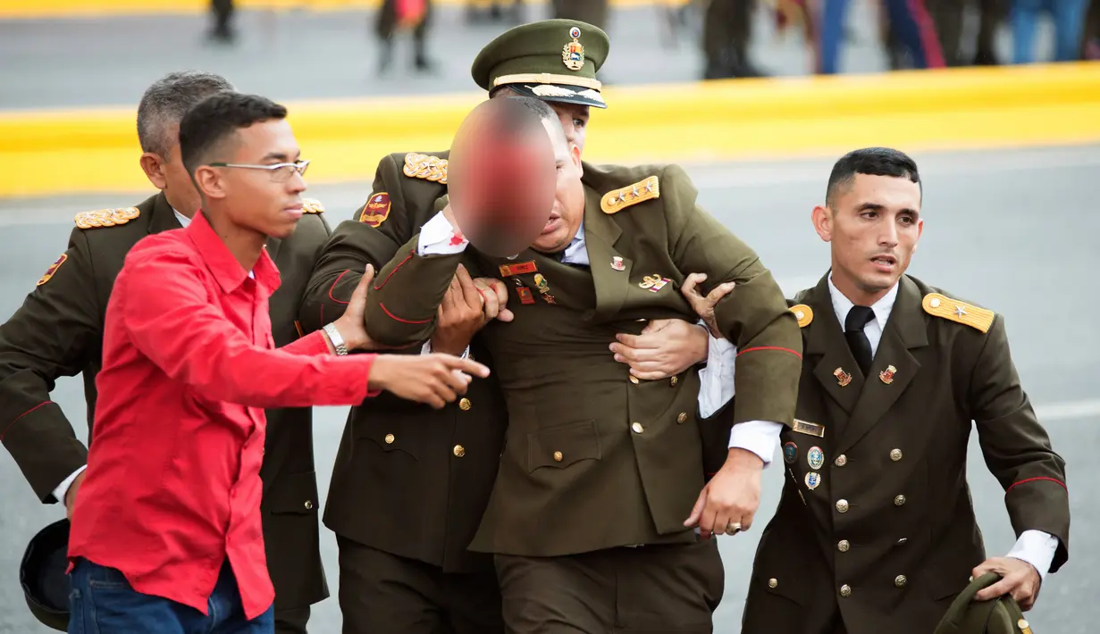 Seorang pejabat militer terluka di kepala setelah insiden serangan drone berbahan peledak terhadap Presiden Venezuela Nicolas Maduro di Caracas, Venezuela, Sabtu (4/8). (Xinhua via AP)