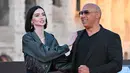 Aktris AS Meadow Walker dan aktor AS Vin Diesel tiba untuk pemutaran perdana film "Fast X", film kesepuluh dalam Fast & Furious Saga, di monumen Colosseum di Roma pada 12 Mei 2023. (AFP/Alberto Pizzoli)