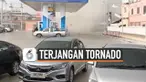 Karyawan pom bensin berlari mencari perlindungan ketika tornado menerjang tempat kerjanya di Samut Prakan, Thailand. Beberapa warga yang berada di tempat berhasil merekam momen menegangkan ini.