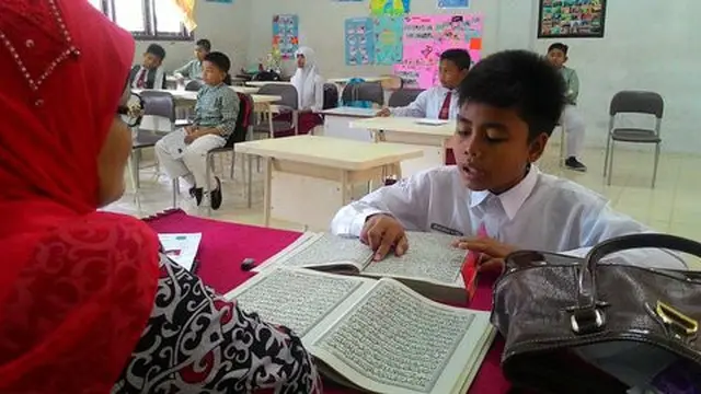 Tes baca Alquran di Aceh. ©2015 merdeka.com/afif
