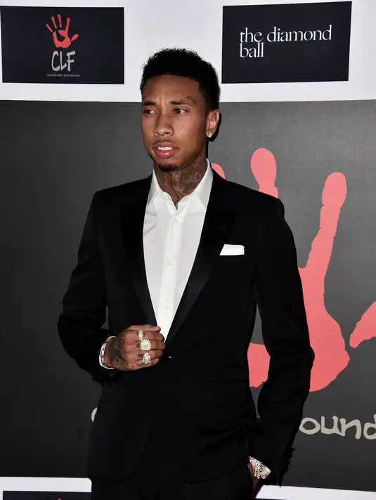 Tyga menilai penampilan Kylie Jenner membosankan. Tyga selalu bilang Kylie Jenner bertubuh gemuk dan lebar, Tyga berharap Kylie segera operasi sedot lemak dan penambahan implan pada bagian bokong agar terlihat lebih sintal. (AFP/Bintang.com)