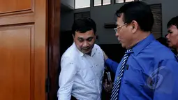 AKBP Irsan saat mendatangi ruang sidang. Ia menjadi saksi dalam sidang lanjutan Praperadilan Budi Gunawan di Pengadilan Negeri Jakarta Selatan, Selasa (10/2/2015). (Liputan6.com/Johan Tallo)