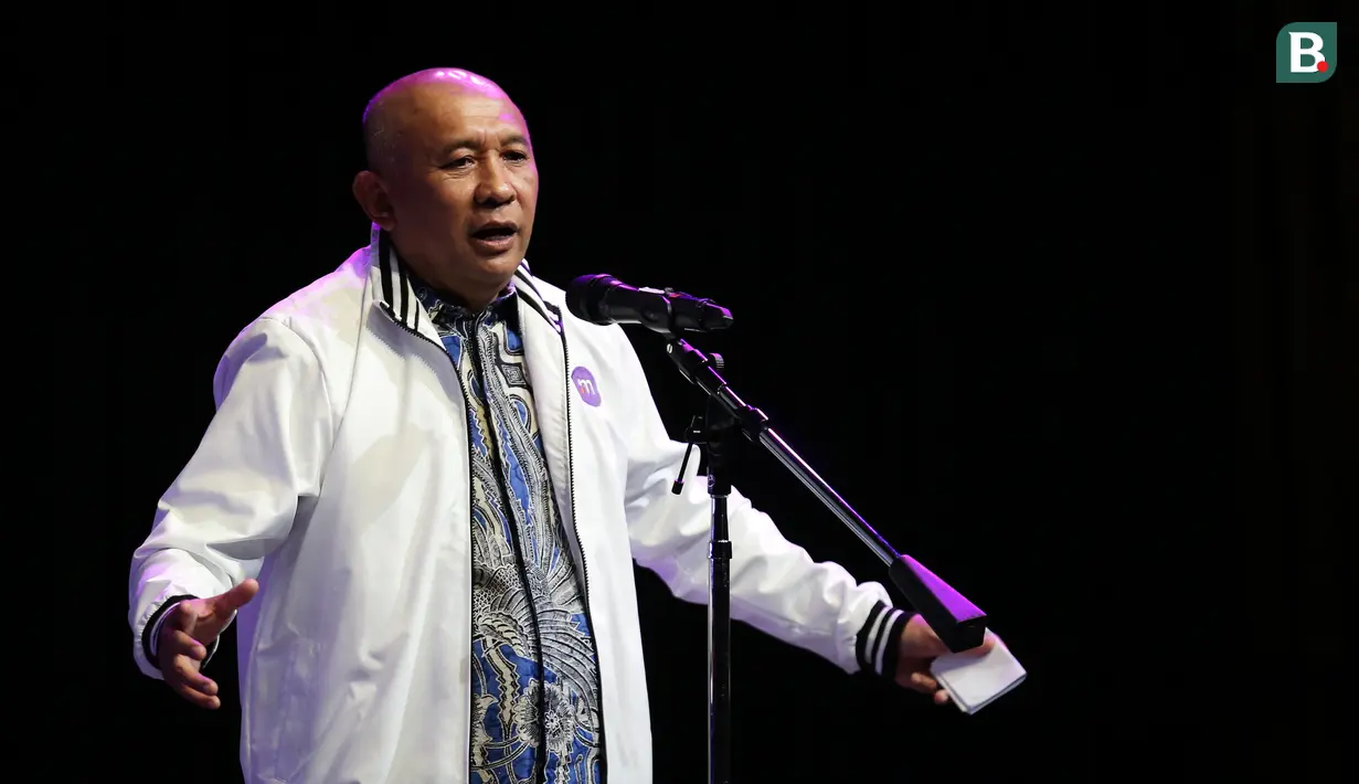 Menteri Koperasi dan Usaha Kecil dan Menengah Indonesia, Teten Masduki memberikan sambutan saat Perayaan Hari Jadi dan Grand Launching Logo Baru Merdeka.com yang berlangsung di SCTV Tower, Senayan, Jakarta, Selasa (21/02/2023). (Bola.com/Bagaskara Lazuardi)