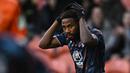 Ekspresi kecewa striker Nottingham Forest, Emmanuel Dennis setelah gagal memanfaatkan peluang saat menghadapi Blackpool pada laga putaran ketiga Piala FA 2022/2023 di Bloomfield Road, Blackpool (7/1/2023). Pemain asal Nigeria ini didatangkan Nottingham Forest dari watford pada awal musim 2022/2023 dan dikontrak selama 4 tahun hingga Juni 2026. Di Liga Inggris 2022/2023 ia telah bermain 11 kali dengan torehan 1 gol dan 1 assist. (AFP/Paul Ellis)