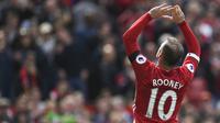 Selama 13 tahun bersama MU, Wayne Rooney berhasil mendulang 253 gol dalam 559 pertandingan. (AFP/Oli Scarff)