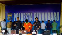 Tersangka penganiaya warga di jalanan Kota Pekanbaru yang merupakan anggota geng motor di Pekanbaru. (Liputan6.com/M Syukur)