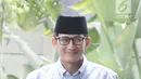 Bakal calon wakil presiden, Sandiaga Uno tiba di gedung KPK, Jakarta, Selasa (14/8). Kedatangan Sandiaga untuk melaporkan LHKPN yang merupakan bagian dari syarat pencalonan dirinya sebagai bakal cawapres. (Liputan6.com/Herman Zakharia)