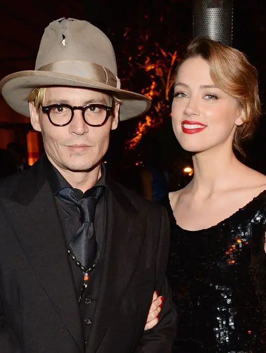 Amber pun menuliskan bahwa dirinya tidak megharapkan kasihan dari orang lain, namun melalui suratnya itu ia hanya tak ingin menjadi korban kekerasan. (AFP/Bintang.com)