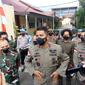 Kapolda Sulteng, Irjen Pol. Rudy Sufahriadi bersama Danrem 132 Tadulako usai melihat jenazah Askar yang diautopsi di RS Bhayangkara Palu, Jumat (30/9/2022). (Foto: Heri Susanto/ Liputan6.com).
