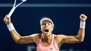 Ekspresi Anett Kontaveit saat mengalahkan Maria Sharapova dalam putaran pertama turnamen tenis putri Piala Rogers di Toronto, Kanada, Senin (5/8/2019). Anett menaklukkan Sharapova dengan skor 4-6, 6-3, dan 6-4. (Mark Blinch/The Canadian Press via AP)