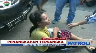 Suaminya ditangkap polisi karena diduga edarkan narkoba, wanita ini marah dan mengamuk di tengah jalan.