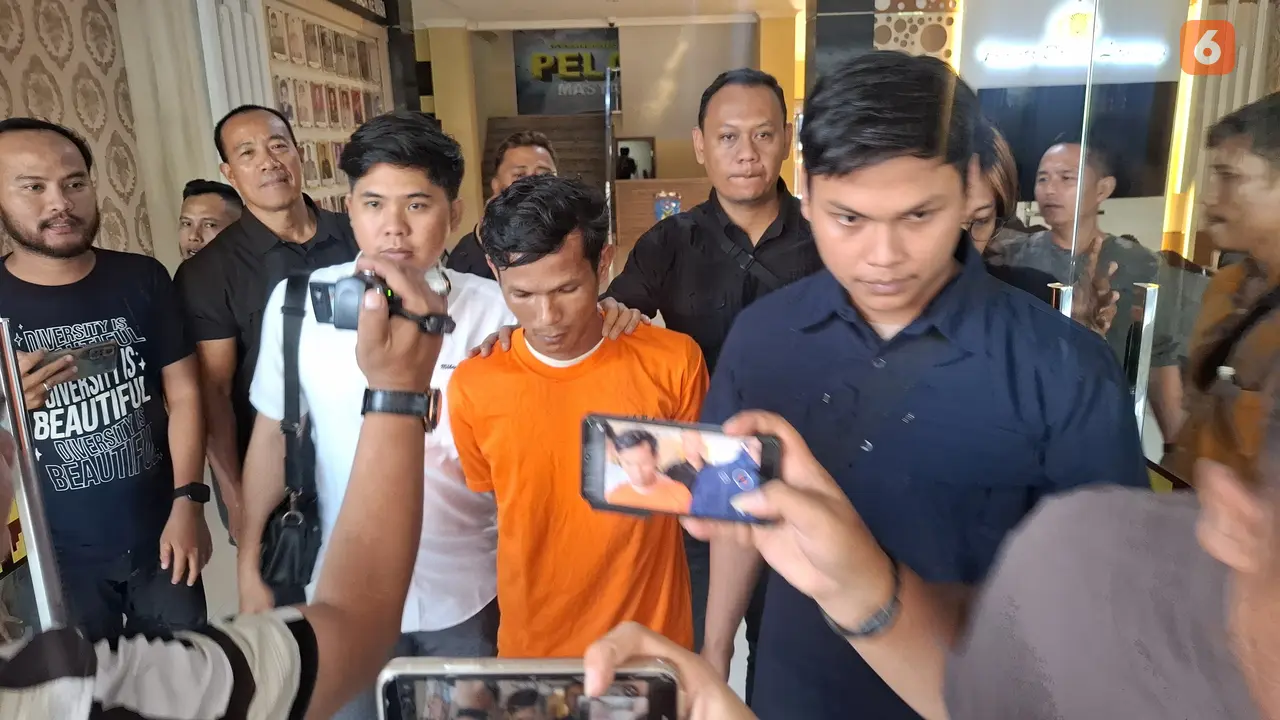 Tersangka Hengki pembunuh istrinya sendiri di Bandar Lampung. Foto : (Liputan6.com/Ardi).