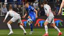 Hanya saja, Portugal menang selisih gol atas Bosnia and Herzegovina usai mengalahkan Liechtenstein dengan skor 4-0. (ELVIS BARUKCIC/AFP)