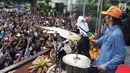 Suasana dalam Aksi Simpatik Jurus Tandur Dukung KPK, Jakarta, Kamis (13/7). Acara diadakan sebagai bentuk dukungan terhadap KPK serta penolakan hak angket yang dilakukan DPR kepada lembaga antikorupsi itu. (Liputan6.com/Immanuel Antonius)