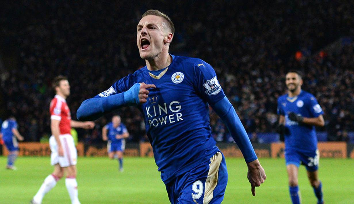 Striker Leicester, Jamie Vardy sukses mengukir prestasi dengan memecahkan rekor Ruud Van Nistelrooy. Pesepak bola Inggris itu berhasil mencetak 11 gol secara beruntun dalam 11 pertandingan. (AFP/Oli Scarff)