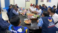 Eri Cahyadi dan Armuji mendaftar Pilkada Surabaya ke Nasdem. (Dian Kurniawan/Liputan6.com)