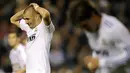 Raut penyesalan dari striker Real Madrid Karim Benzema seusai ditahan imbang 0-0 Deportivo La Coruna dalam laga lanjutan La Liga di Estadio Riazor pada 26 Februari 2011. AFP PHOTO/MIGUEL RIOPA