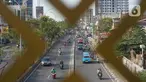 Kendaraan melintasi Jalan Margonda Raya, Depok, Jawa Barat, Selasa (20/11/2019). Badan Pengelola Transportasi Jabodetabek (BPTJ) menetapkan ruas Jalan Margonda Raya menjadi jalan berbayar melalui sistem electronic road pricing (ERP) pada akhir 2020. (Liputan6.com/Immanuel Antonius)