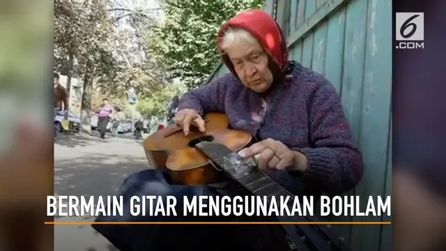 Nenek berusia 81 tahun memainkan gitar menggunakan lampu  bohlam.