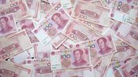 Ilustrasi mata uang yuan China. (dok. Eric Prouzet/Unsplash)
