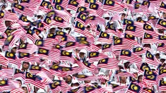 Malaysia merupakan salah satu negara yang menjalankan tradisi mudik menjelang Idul Fitri. Istilah 'mudik' biasa disebut warga Malaysia sebagai 'Balik Kampung'. (AFP PHOTO/ Manan VATSYAYANA)