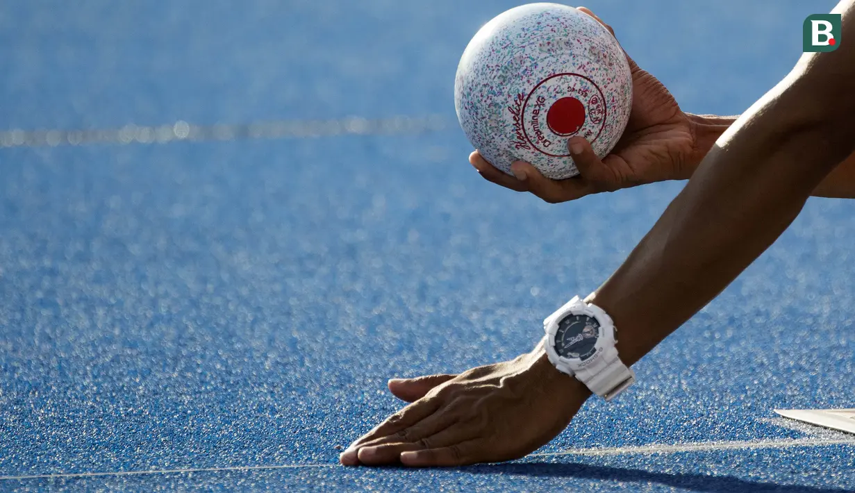 Kacung atlet Lawnball Indonesia bertanding di nomor B2 Open Single's pada Asian Para Games 2018 di Stadion Hockey, Gelora Bung Karno Jakarta, Senin (8/10/2018).(Bola.com/Peksi Cahyo)
