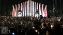 Ribuan pendukung Ahok menggelar acara Malam Solidaritas atas Matinya Keadilan di Tugu Proklamasi, Jakarta (10/05). Massa datang untuk bersimpati kepada Ahok karena dihukum kurungan penjara dua tahun. (Liputan6.com/Faizal Fanani)