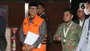 Dalam kasus ini, KPK menyita beberapa barang bukti, termasuk dua mobil mewah dari pihak terkait. Tampak dalam foto, Wali Kota Madiun nonaktif, Maidi, sesaat sebelum meninggalkan Gedung Merah Putih Komisi Pemberantasan Korupsi (KPK) usai menjalani pemeriksaan lanjutan, Jakarta, Kamis (23/4/2026). (Liputan6.com/Helmi Fithriansyah)