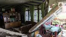 Kondisi rumah warga yang rusak akibat gempa di Desa Sarampad, Kabupaten Cianjur, Jawa Barat, Selasa (22/11/2022). Kerusakan akibat gempa membuat kendaraan tidak bisa melintas untuk membawa bantuan bagi warga terdampak. (Liputan6.com/Herman Zakharia)