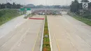 Suasana Jalan Tol Cijago Seksi II ruas Bogor-Kukusan yang sepi aktivitas di Depok, Jawa Barat, Senin (17/6/2019). Setelah sempat diuji coba selama dua pekan, ruas tol yang nantinya menghubungkan jalur Jagorawi-Cinere tersebut kembali ditutup untuk umum. (Liputan6.com/Immanuel Antonius)