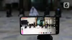 Para Imam Masjid Agung Sunda Kelapa menggemakan takbir malam Idul Fitri 1441 H yang disiarkan langsung melalui beragam media sosial, Jakarta, Sabtu (23/5/2020). Gema takbir yang disiarkan secara virtual untuk menghindari penyebaran virus COVID-19. (Liputan6.com/Helmi Fithriansyah)