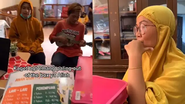 Seorang ibu menikmati nyanyian dari dua orang pengamen