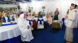 Ketua MPR Zulkifli Hasan memberikan sambutan dihadapan Badan Musyawarah Organisasi Islam Wanita Indonesia (BMOIWI) dan perwakilan ormas Islam perempuan di Rumah Dinas Ketua MPR, Jakarta, Selasa (29/5). (Liputan6.com/Johan Tallo)