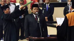 Wakil Ketua DPD terpilih Akhmad Muqowam mengucap sumpah jabatan saat dilantik, Jakarta, Kamis (26/7). Pemilihan ini merupakan kelanjutan dari berlakunya UU Nomor 2 Tahun 2018 tentang MPR, DPR, DPD, dan DPRD (UU MD3). (Liputan6.com/Johan Tallo)