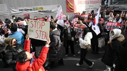 Pengadilan Distrik Barat Seoul mempertimbangkan apakah akan memperpanjang penahanan Presiden Korea Selatan yang dimakzulkan, Yoon Suk Yeol. (JUNG Yeon-je/AFP)
