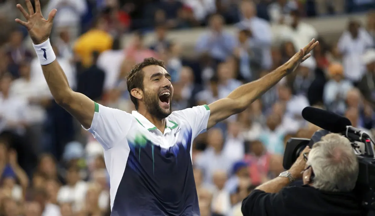 Petenis Kroasia, Marin Cilic, berteriak usai menghentikan perlawanan Kei Nishikori (Jepang) di final tunggal putra turnamen tenis US Open 2014, New York, (8/9/2014). (REUTERS/Mike Segar)