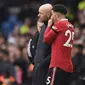 Penyerang sayap Manchester United (MU) Jadon Sancho dan Manajer Erik ten Hag.&nbsp;(Oli SCARFF / AFP)