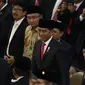 Presiden Joko Widodo atau Jokowi saat menghadiri pelantikan anggota DPR, MPR, dan DPD di Kompleks Parlemen, Jakarta, Selasa (1/10/2019). Para wakil rakyat yang terpilih dalam Pemilihan Umum 2019 dilantik hari ini. (Liputan.com/JohanTallo)