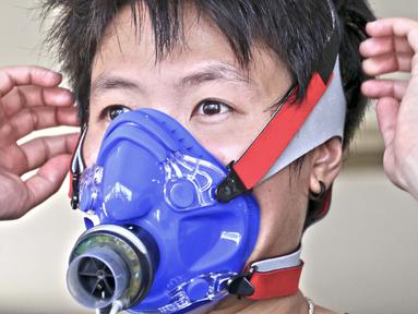 Pebulu Tangkis Indonesia, Liliyana Natsir melakukan test Sport Science sebagai persiapan menuju Olympiade Rio De Jeneiro 2016 di Gedung PP ITKON, Satlak Prima, Jakarta, Kamis (07/01/2016). (Bola.com/Nicklas Hanoatubun) 