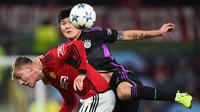 Kim Min Jae merupakan pemain Asia yang kini berkarier di Bayern Munchen. Dirinya dipanggil Timnas Korea Selatan asuhan Juergen Klinsmann untuk mengisi posisi bek tengah pada Piala Asia 2023. Ia akan menjadi tembok tangguh di barisan belakang Taeguk Warriors. (AFP/Peter Powell)