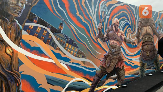 <p>Mural God of War Ragnarok di Kota Tua yang menampilkan Kratos, Atreus, dan Thor sedang bertarung. (/ Yuslianson)</p>